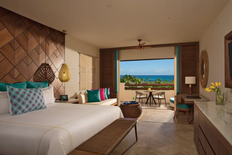 Junior Suite Ocean View with balcony overlooking the Caribbean Sea at Secrets Maroma Beach Riviera Cancun.