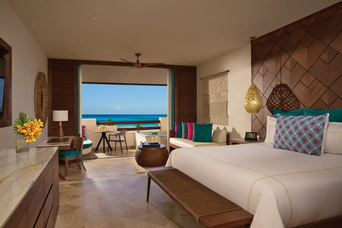 Preferred Club Junior Suite Ocean Front with king bed and direct Caribbean views at Secrets Maroma Beach Riviera Cancun.