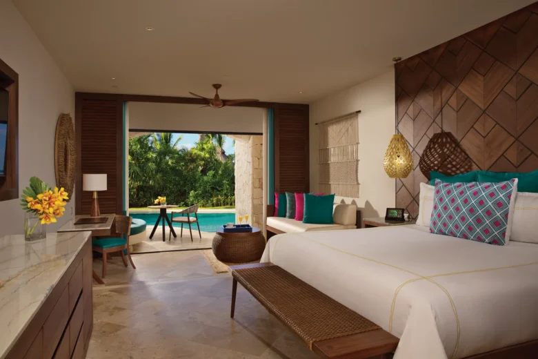 Preferred Club Junior Suite Swim Out with king bed and terrace access at Secrets Maroma Beach Riviera Cancun.