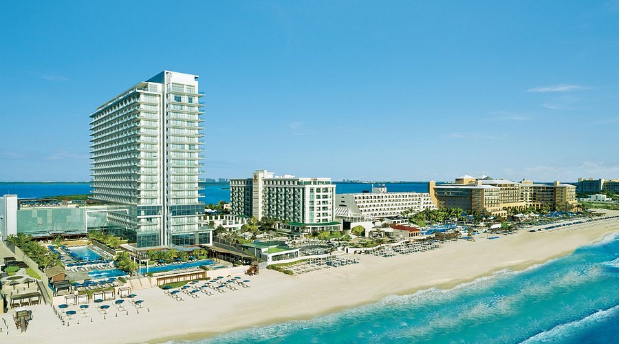 Secrets The Vine Cancun adults-only all-inclusive resort with modern architecture, rooftop wine lounge, and beachfront location in Cancun's Hotel Zone.