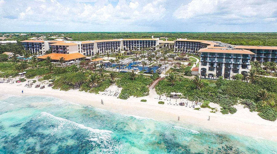 UNICO 20°87° Hotel Riviera Maya adults-only all-inclusive resort with modern design, beachfront pools, and immersive Mexican cultural experiences.